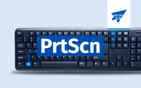 Klawiatura z widocznym napisem "PrtScn" na niebieskim tle. To wycinek ekranu skrót do robienia zrzutów.