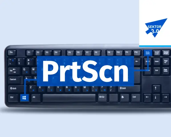 Klawiatura z widocznym napisem "PrtScn" na niebieskim tle. To wycinek ekranu skrót do robienia zrzutów.