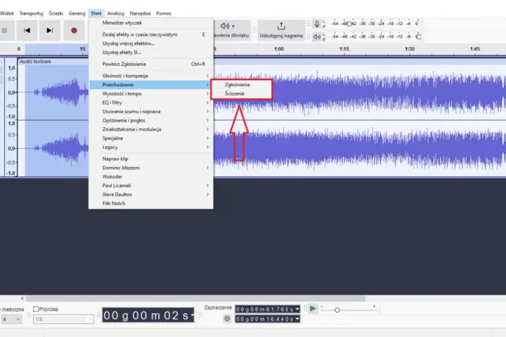 Audacity po polsku: menu "Efekt" z opcjami "Zgłośnienie" i "Ściszenie" na fali dźwiękowej.