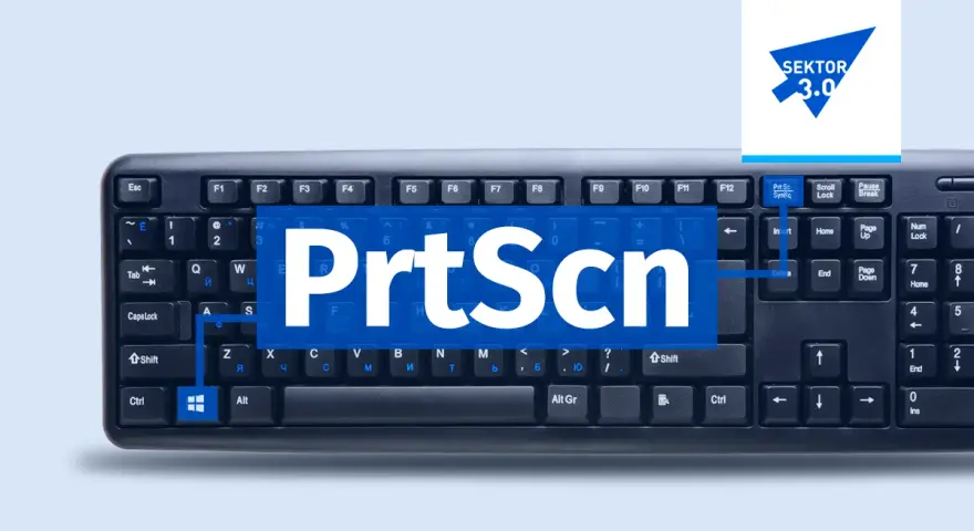 Klawiatura z widocznym napisem "PrtScn" na niebieskim tle. To wycinek ekranu skrót do robienia zrzutów.