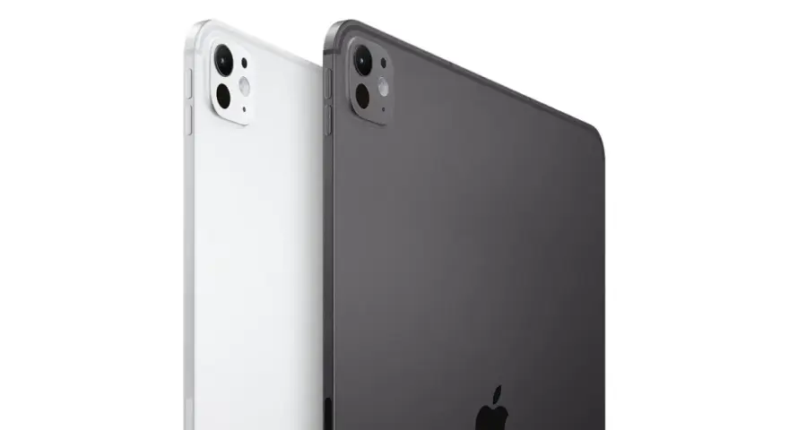 Dwa najnowsze iPady Pro, biały i grafitowy, prezentują swoje aparaty i logo Apple.